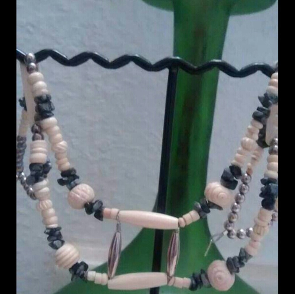 Hand carved bone and Sterling silver choker